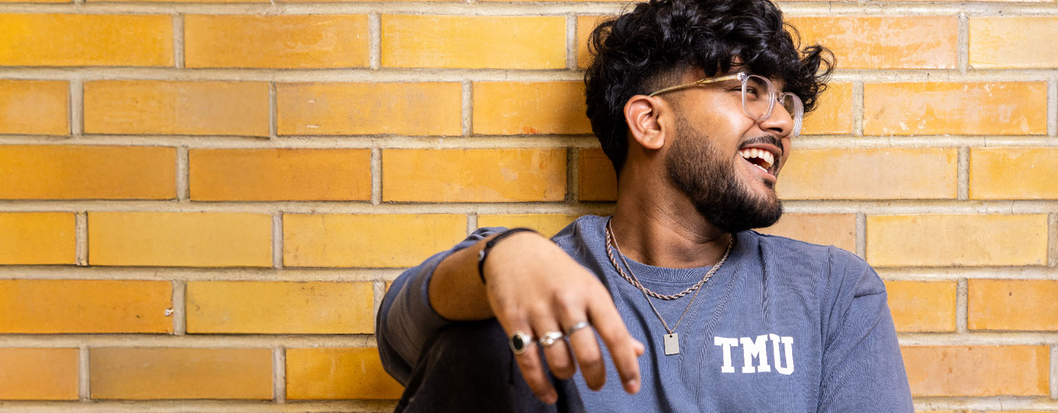 Student in MV Sports Shirt