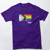A  short-sleeved purple t-shirt features the Pride Progress flag with a small TMU in white.