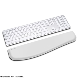 A white Kensington brand wrist rest with a white wireless keyboard.