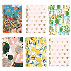 Six Bloom brand softcover, spiral ring planners. Planners come in a variety of botanical prints and abstract designs.