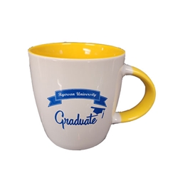 A white coffee mug with Ryerson University in a blue banner and Graduate in blue text appearing on the side. Inside the mug is yellow
